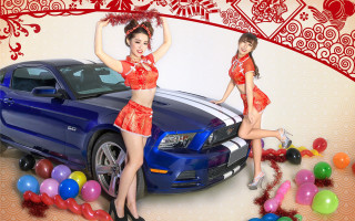 Two women red outfits blue - promotional image free wallpaper