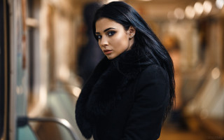 Woman blackhair subway serious portrait - serious free wallpaper for desktop