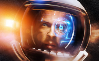 Futuristic astronaut glowing eyes planet - free sci-fi wallpaper