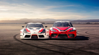 Two cars race track mountains - a race track free wallpaper for desktop