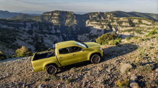 Yellow truck rocky hill mountains - a yellow truck free wallpaper