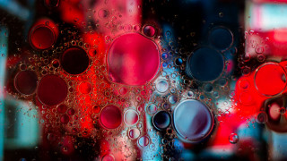 Window waterdrops redbuilding redlight abstract - a close up of a window free wallpaper