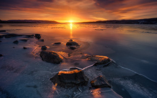 Sunset water rocks mountain crepuscular - orange sun free wallpaper