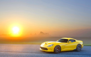 Yellow sports car sunset sun - a yellow sports car free wallpaper