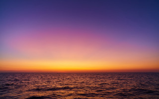 Sunset ocean boat clouds australian - a sunset over the ocean free wallpaper