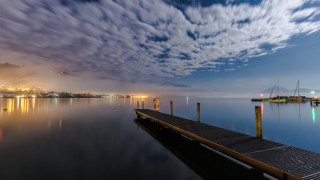 Dock boat city clouds evening - a boat free wallpaper