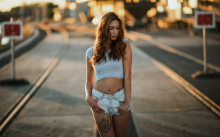 Aramenta dianthe traintrack cinematic blurry - a train track in the background free wallpaper
