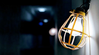 Hanging light bulb dark room - a wall free wallpaper
