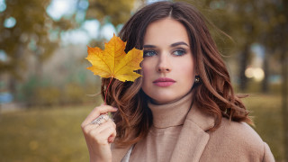 Woman leaf park autumn blurry - a leaf free wallpaper