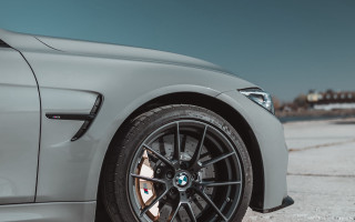 Car tire road sky building - sharp detail free wallpaper