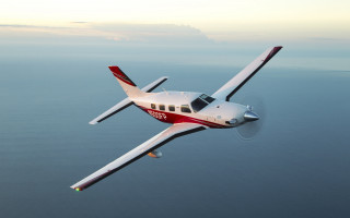 Small plane ocean sunny day - over the ocean free wallpaper