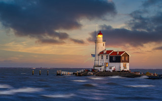 Lighthouse island ocean sunset clouds - a lighthouse free wallpaper