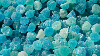 Blue green gummy bears microscopic - a close up of a bunch free wallpaper