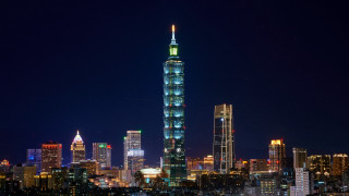 City skyline tower lit night - a few building free wallpaper