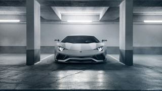 White sports car parking garage - a parking garage free wallpaper