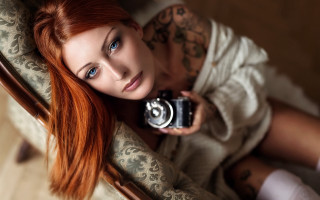 Woman camera tattoo laying bokeh - free portrait wallpaper