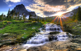 Waterfall mountain sunbeam sky nature 5 - a green field below free wallpaper