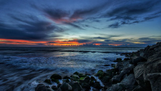 Sunset ocean rocks cloudy sky 5 - rock and water free wallpaper