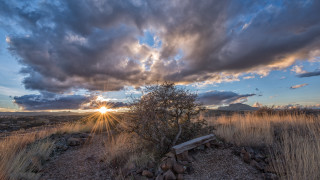 Bench dirt field cloudy sky - crepuscular ray free wallpaper