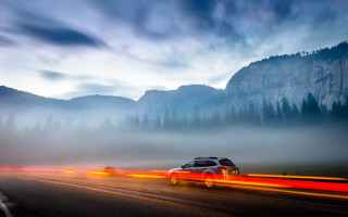 Mountain road fog trees motionblur - a road free wallpaper
