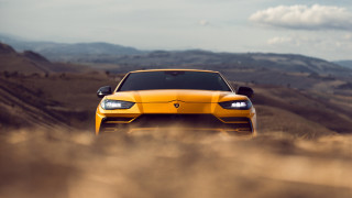 Yellow sports car mountains clouds - 4k uhd image free wallpaper