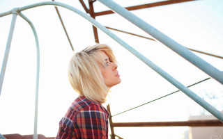 Blonde woman metal structure sky - a sky background and sun free wallpaper