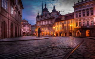 Cobblestone street clock tower dusk - a cobblestone street free wallpaper