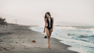 Woman beach dog sand sunset - andrea orcagna free wallpaper