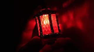 Red light holding portrait rembrandt - a hand free wallpaper