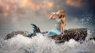 Woman blue dress rock ocean - a rock in the ocean free wallpaper
