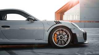 White sports car parking lot 31 - romanesque free wallpaper
