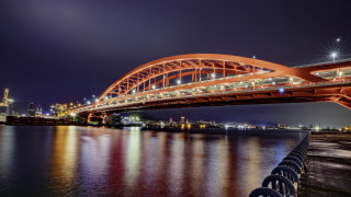 Christo bridge city lights night - a bridge over a body of water free wallpaper