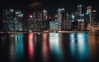 City skyline night boat water 10 - the water and buildings free wallpaper