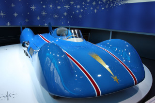 Blue race car museum exhibit - perfect symmetry free wallpaper