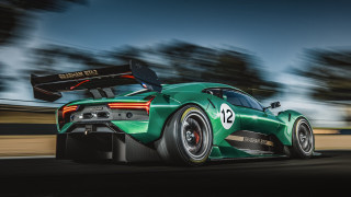 Green sports car race track 5 - a green sports car free wallpaper