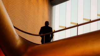 Man in suit staircase building - les automatiste free wallpaper