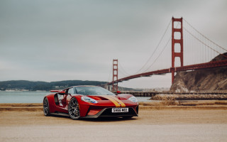 Red sports car bridge water - a bridge and a body of water free wallpaper