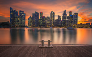 City skyline sunset pier bench - a bench free wallpaper