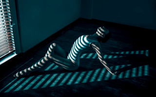 Woman blinds shadow opart marble - the floor in a room free wallpaper