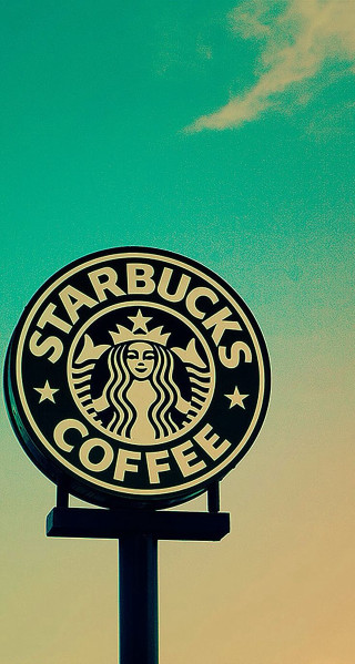 Starbucks sign blue sky clouds - a green sky free wallpaper