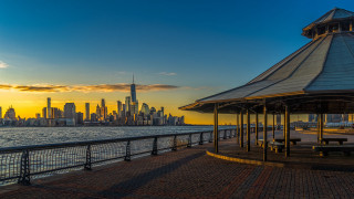 Gazebo pier city skyline sunset - a city skyline in the background free wallpaper
