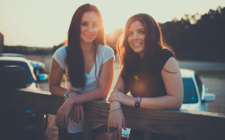 Two women bench truck sunset - two woman free wallpaper