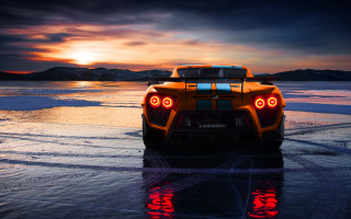 Sports car beach sunset reflection - panfuturism free wallpaper