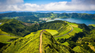 Scenic green mountain lake road - a green mountain free wallpaper