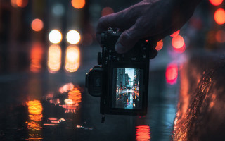 City lights night camera bokeh - a camera in front free wallpaper