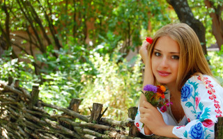 Woman fence flowers smile outdoors - a smile free wallpaper for desktop