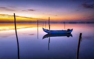 Boat sunset dawn ocean cloudy - the distance behind free wallpaper