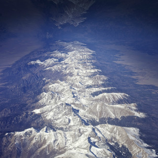 Mountain range airplane window sky - superflat free wallpaper
