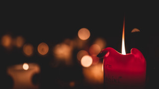 Candle red candleholder blurry background - a candle free wallpaper