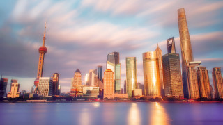 City skyline river bridge eastern - a cloudy sky in the background free wallpaper